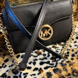 Small jet set MK crossbody bag.